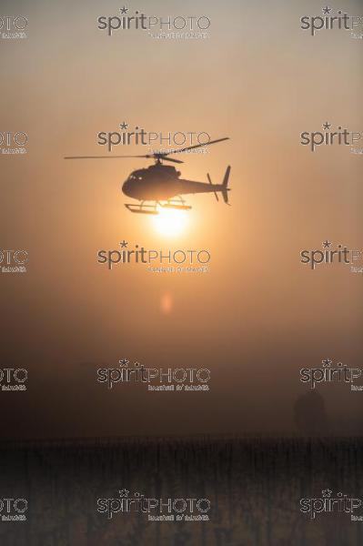 Helicopter being used to circulate warmer air and prevent frost damage to vineyard in sub-zero spring temperatures of 7 April 2021. Château Laroze, St-Émilion, Gironde, France. [Saint-Émilion / Bordeaux] (JBN_3721.jpg)